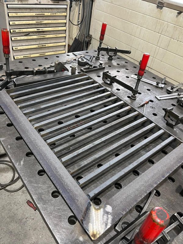 Begin van kelderrooster